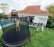 Bild in Galerie-Viewer laden, Young girl jumping on the trampoline with her brother and mother playing outside
