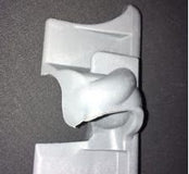 Load image into Gallery viewer, A single white cleat designed for soccer shoes