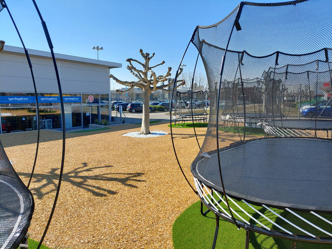 backyard or showroom warehouse of springfree trampoline