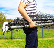 Charger l'image dans la visionneuse de galerie, Man holding a unassembled trampoline