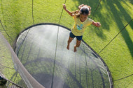 Bild in Galerie-Viewer laden, Girl jumping on a springfree trampoline