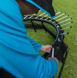 Load image into Gallery viewer, a man installing a trampoline 
