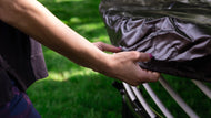 Bild in Galerie-Viewer laden, hands of a lady putting a cover to an outdoor trampoline
